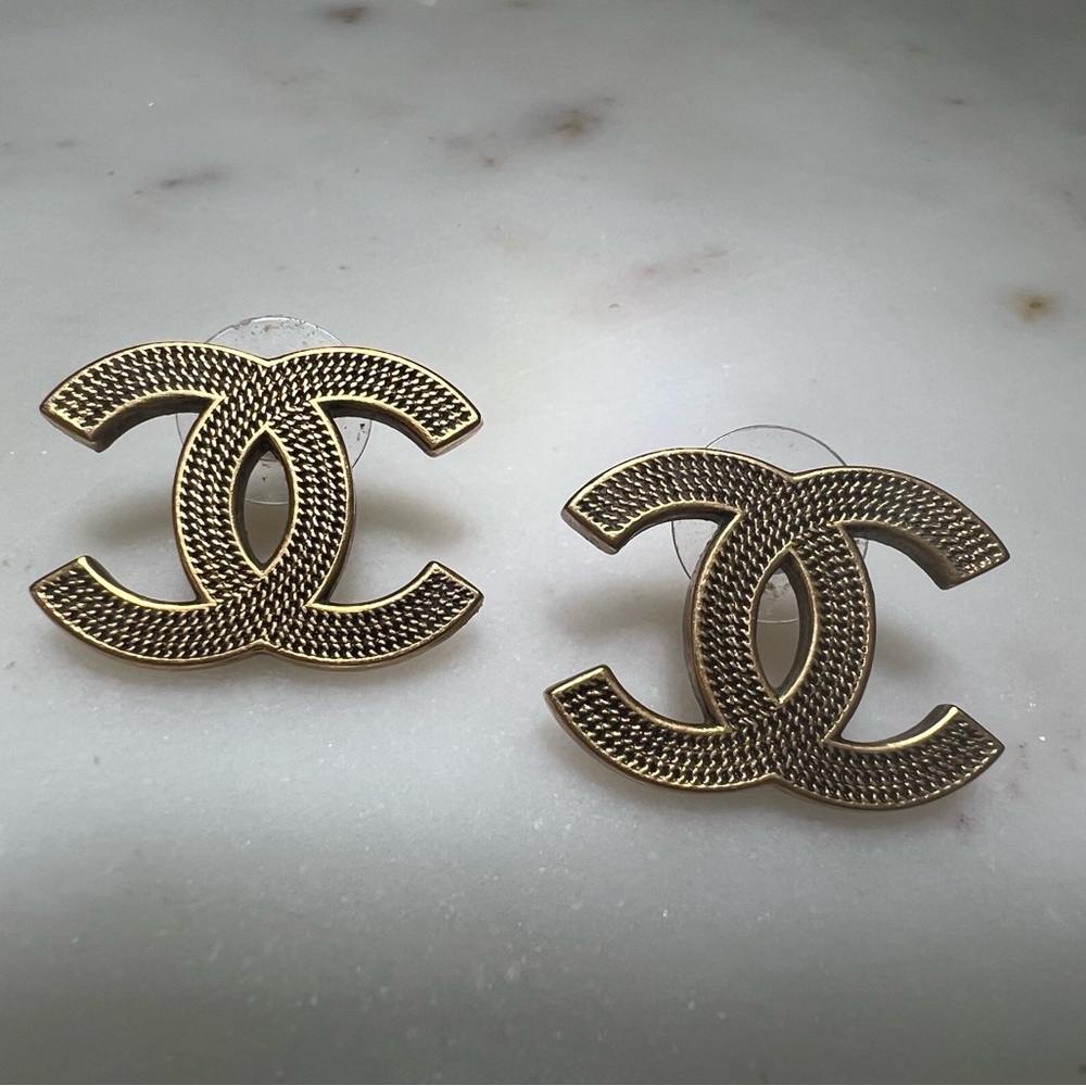 Gold Chanel stud earrings